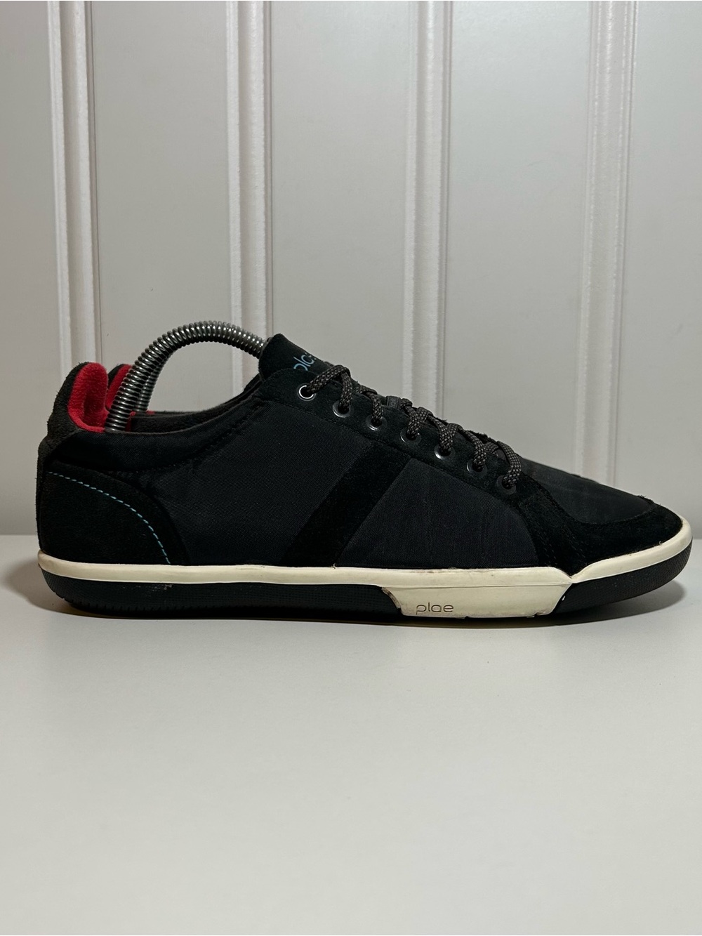 PLAE prospect Men's Black Sneakers with Red Interior Accents